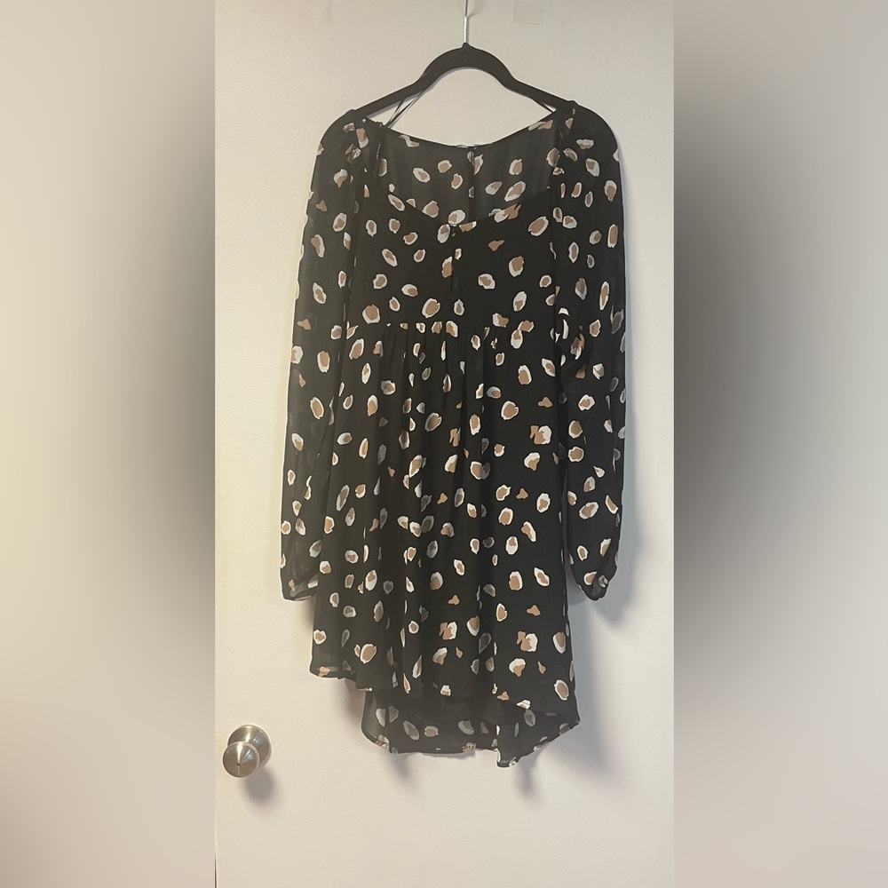 NEW.  Women’s long sleeve animal print babydoll dress. Size Small